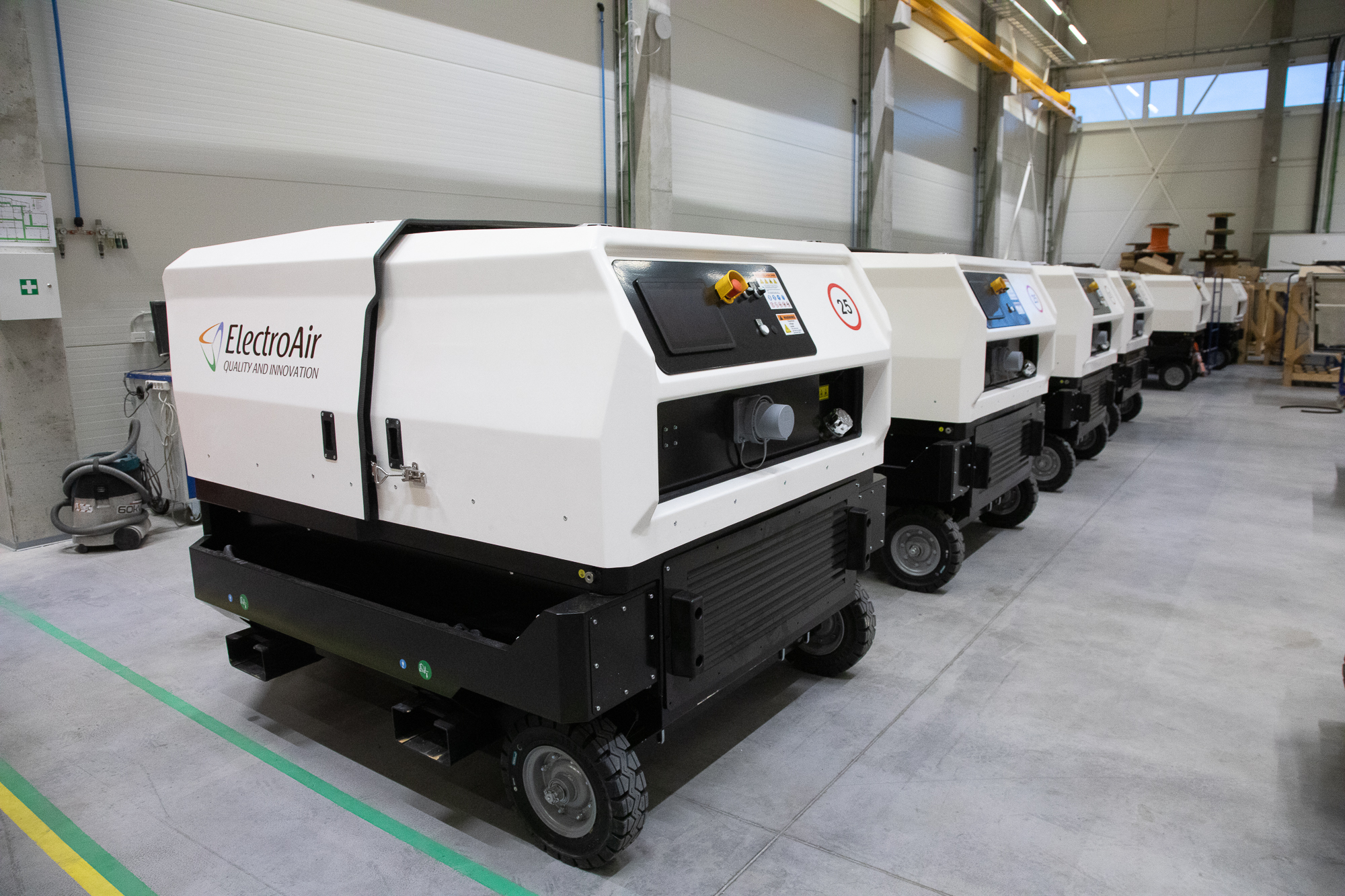 Fleet of APA-65 Ground Power Units by ElectroAir inside factory