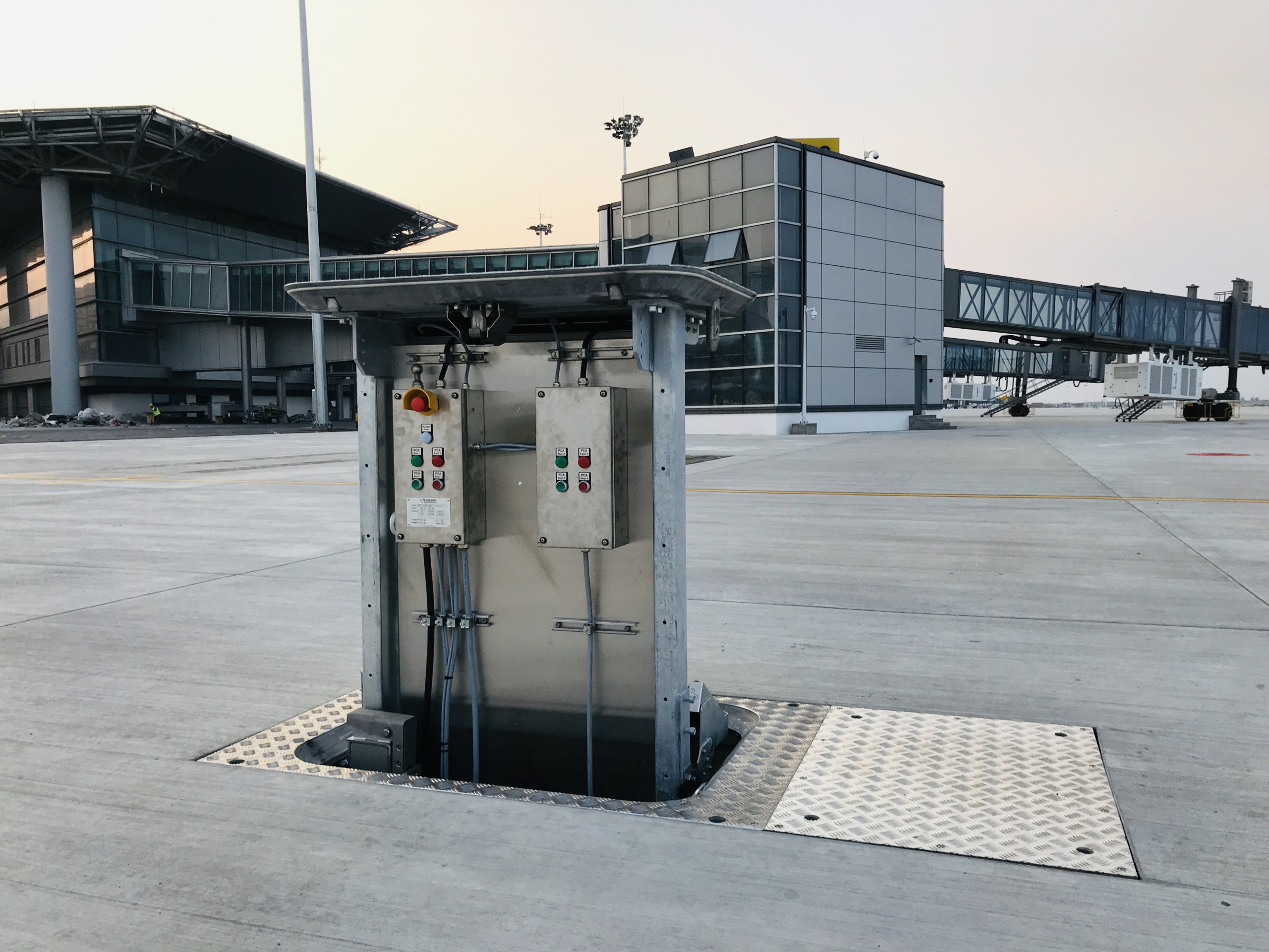 ElectroAir hatch PIT system on the airport apron providing underground power and service connections for aircraft.