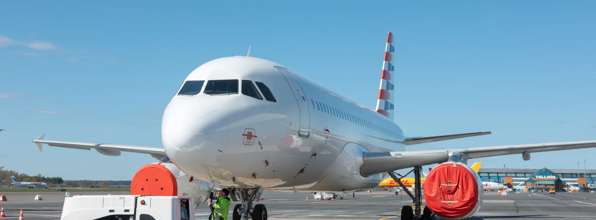 ElectroAir ground power unit in operation with an aircraft at the airport