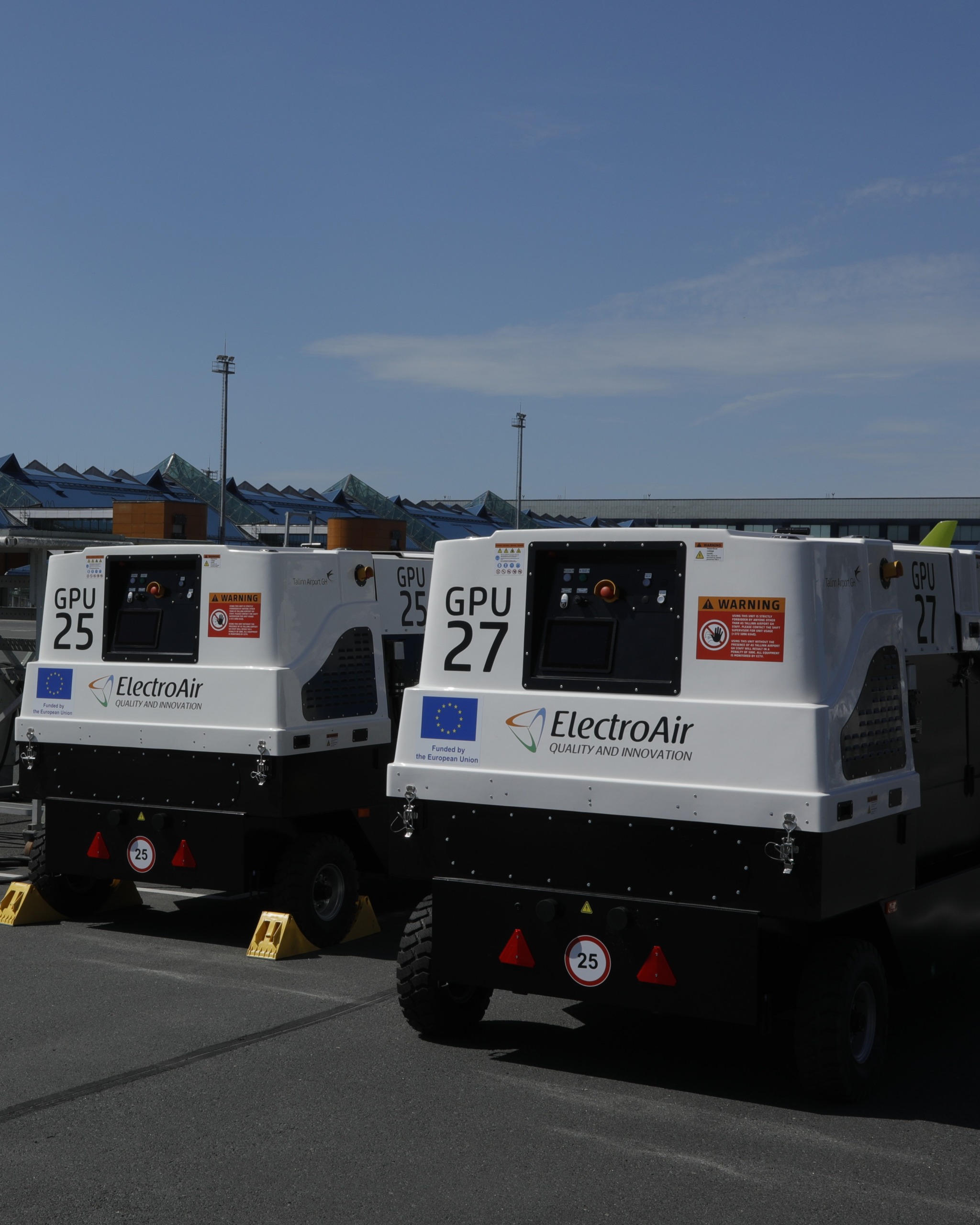 ElectroAir mobile Ground Power Units on an airport apron providing safe 400 Hz AC and 28 V DC aircraft power